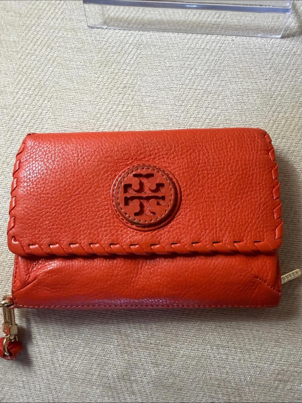 Tory Burch Orange Leather Wristlet with Logo Medallion